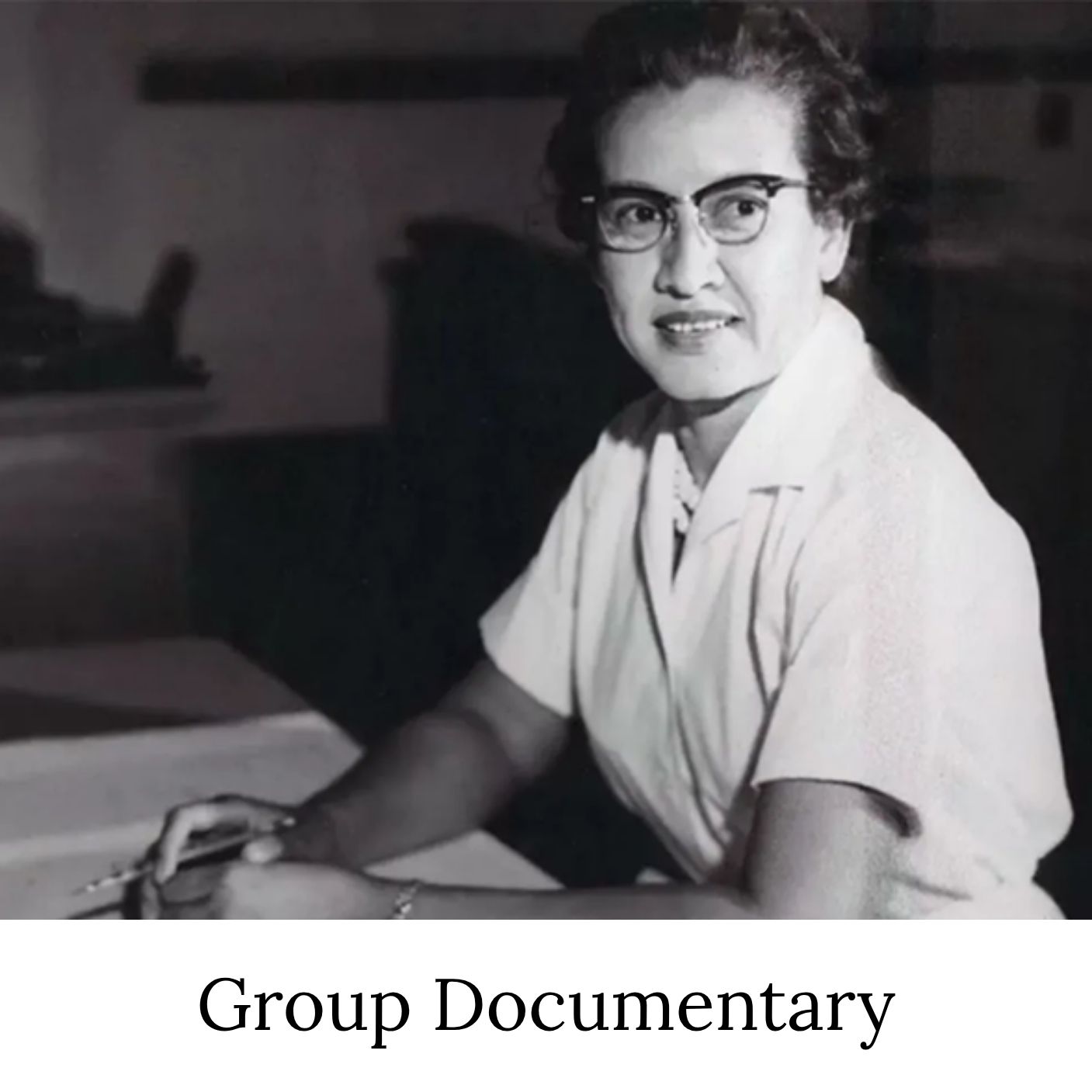 B&W photo of a Black woman in a white collared shirt and wearing glasses. The image is labeled Group Documentary.