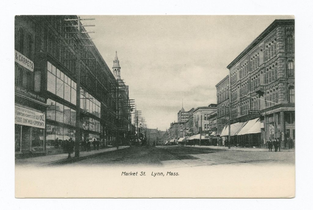 Street lined with buildings and telephone poles