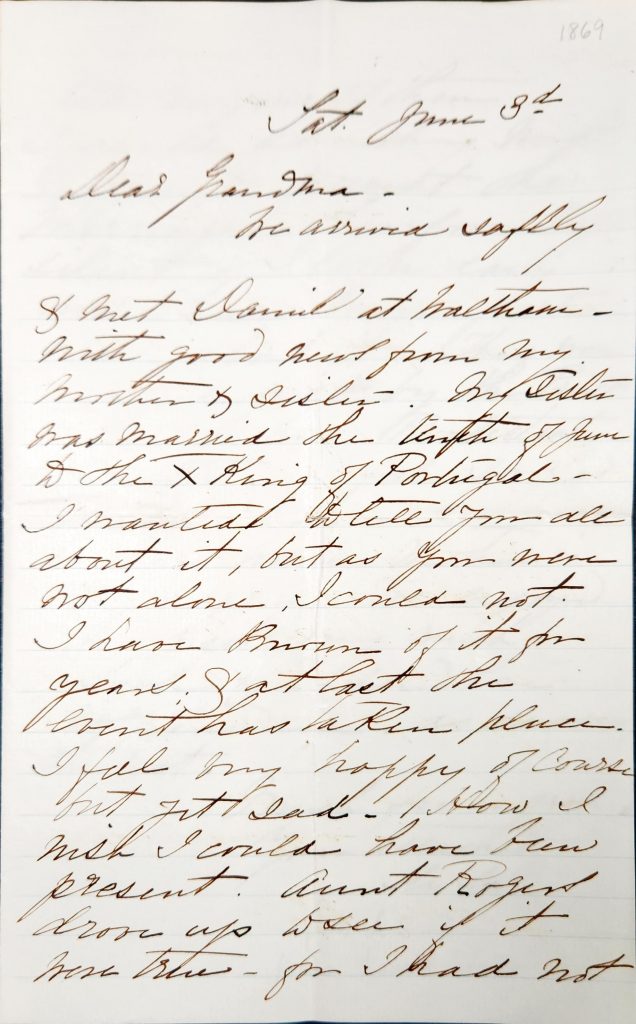 Color photograph of a black ink handwritten letter on paper discolored with age. 