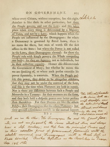 A color photograph of a book page with words in black ink printed text with lighter more brown ink underlining, and notes, especially in the lower half of the page. 