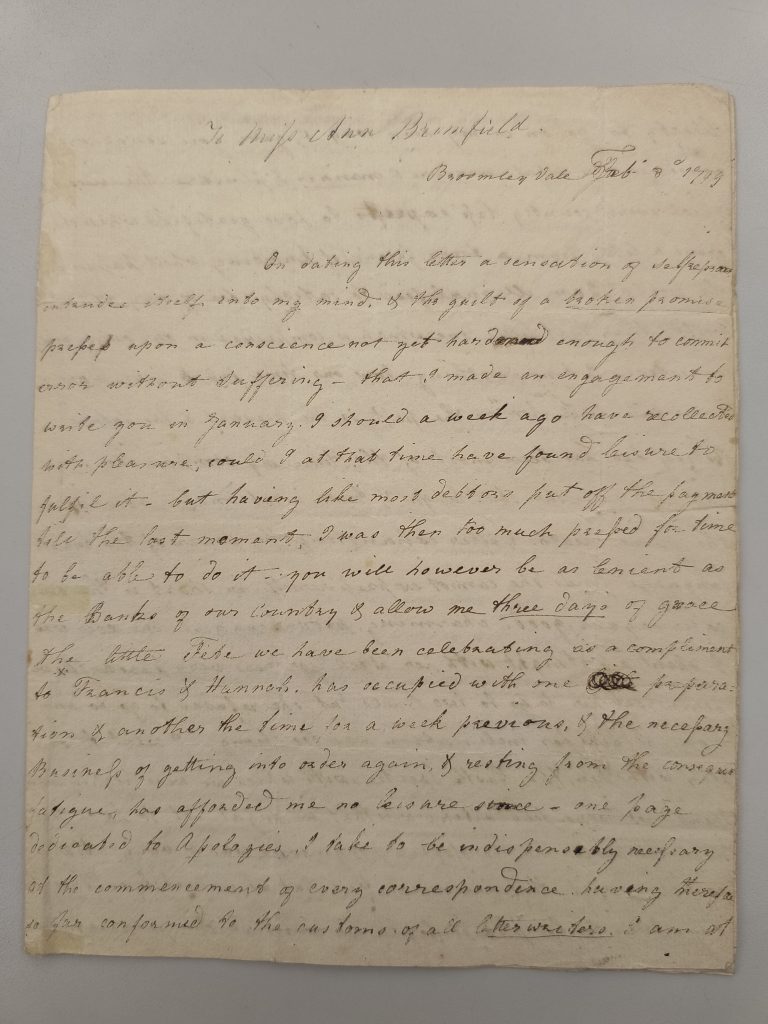 Color photograph of the first page of a manuscript letter written in black ink, beginning “To Miss Ann Bromfield” and dated at “Broomley Vale,” February 3, 1799. The paper is yellowed with age and has a few stains around the edges, ink smudges, underlines, and cross-outs.