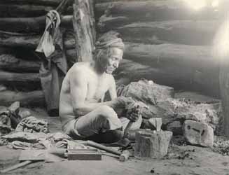 Unidentified man metalworking Platinotype photograph