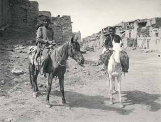 People on ponies, at the village of Oraibi Platinotype photograph