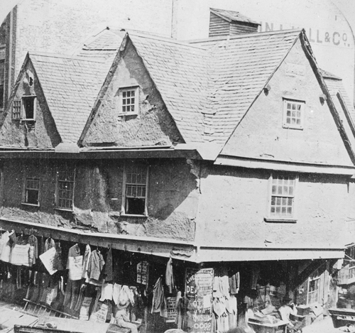 `The Old Feather Store, cor. North St. & Faneuil Hall Sq.` Lantern slide