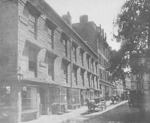 `Tudor Bldg., cor. Court St. & Court Sq.` Lantern slide