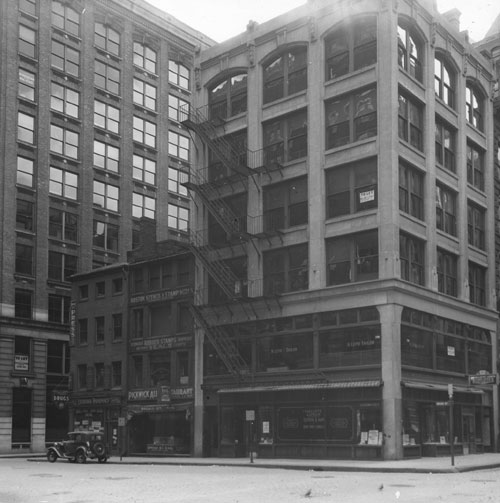 `Cor. Broad & State St., S.W. corner` Lantern slide