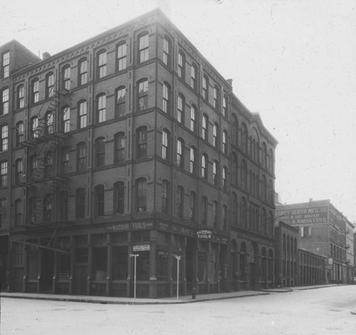 `Cor. Oliver & Purchase St., S.W. corner` Lantern slide