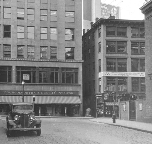 `Cor. Washington & Harvard Place at head of Milk St.` Lantern slide