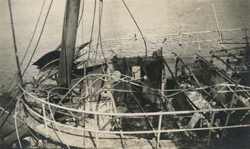 View of the deck of Tugboat Perth Amboy after being damaged in attack by the German submarine, U-156 Photograph