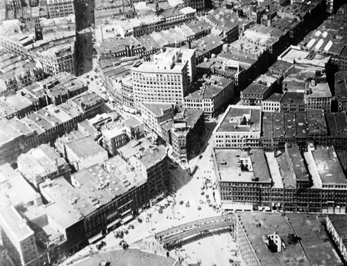 Aerial view of Dewey Square and Church Green (Summer Street and Atlantic Avenue), looking west from over South Station, Boston Lantern slide