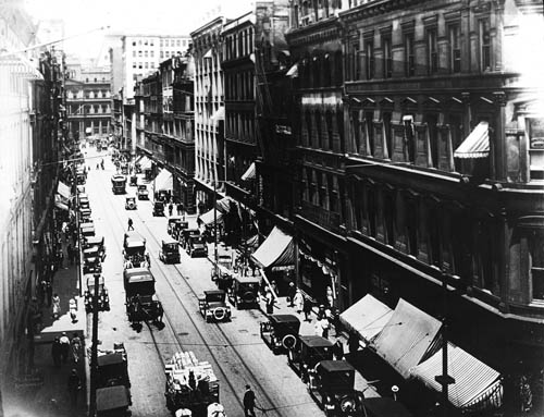 View of street in downtown Boston, possibly Devonshire Street or High Street, Boston Lantern slide