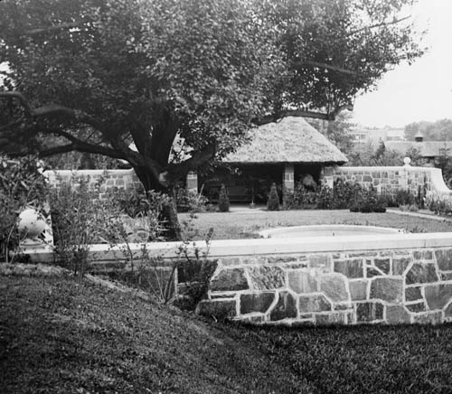 View of garden, unidentified estate Lantern slide