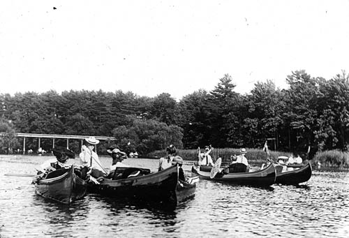 People in canoes on a river Lantern slide