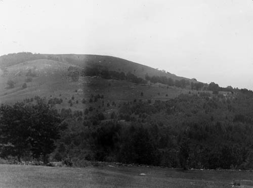 Landscape depicting hills and trees Lantern slide