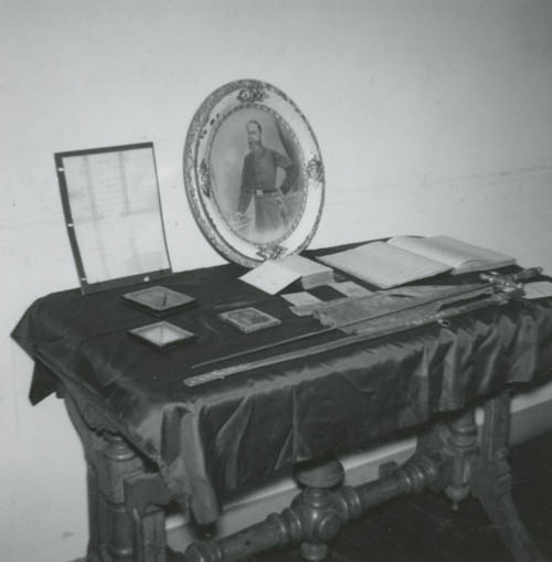 Portrait of John Van Surley DeGrasse and other items on exhibit Photograph