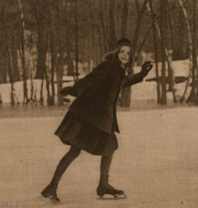 Unidentified girl ice skating Photo clipping from unidentified newspaper