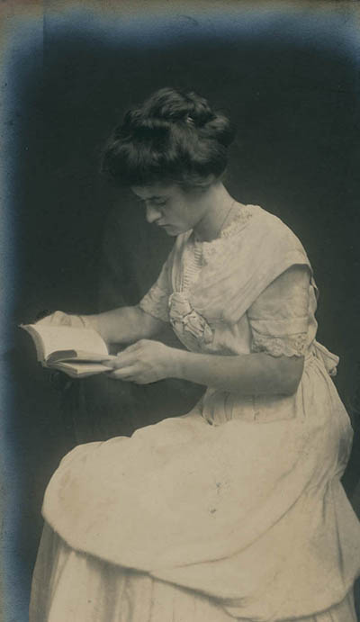 Unidentified woman reading Photograph