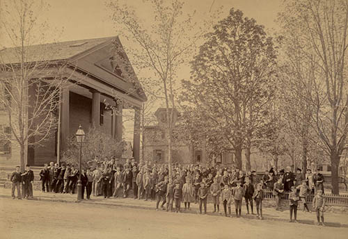 Teachers and students in front of the Allen School building Photograph