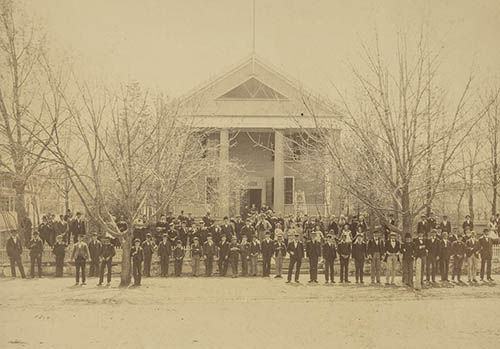 Teachers and students in front of the Allen School building Photograph