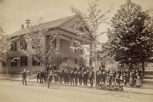 Teachers and students in front of the Allen School building Photograph