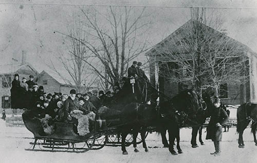 Cate`s Boat Sleigh in front of the Allen School Photograph