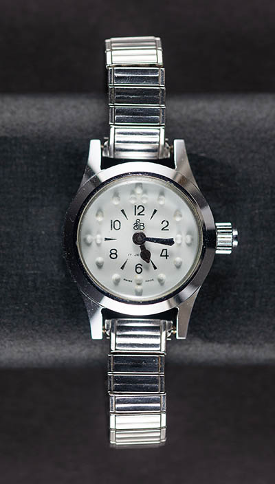 Braille wristwatch belonging to Anastasia Walsh Stainless steel, glass, plastic, blued steel hands